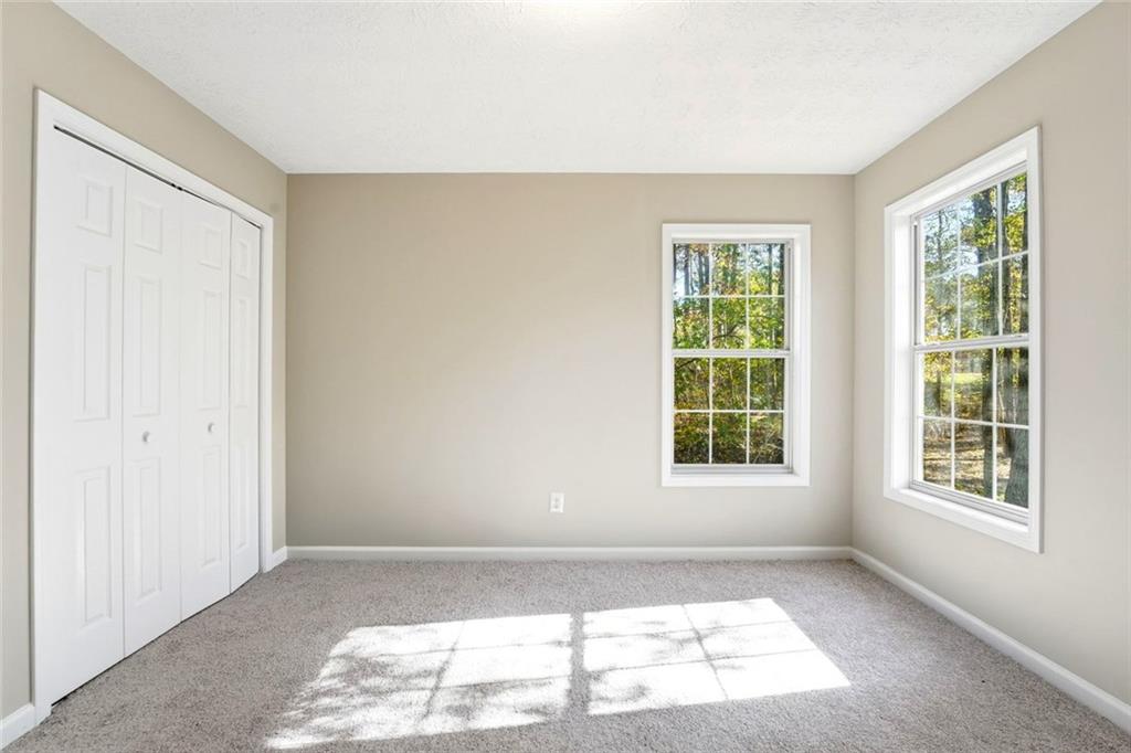 4099 Harvest Ridge Drive Douglasville, GA 30135 - Photo 28 of 46 a view of an empty room and window