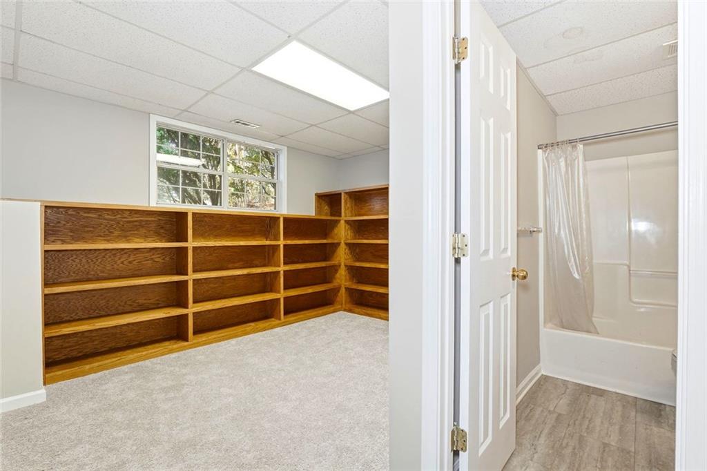 4099 Harvest Ridge Drive Douglasville, GA 30135 - Photo 33 of 46 a view of an empty room with wooden floor and a window