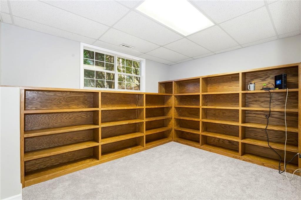 4099 Harvest Ridge Drive Douglasville, GA 30135 - Photo 34 of 46 a view of an empty room with a empty shelves
