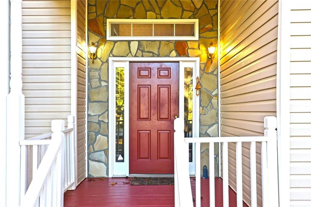 4099 Harvest Ridge Drive Douglasville, GA 30135 - Photo 6 of 46 a front view of a house with a door and a window
