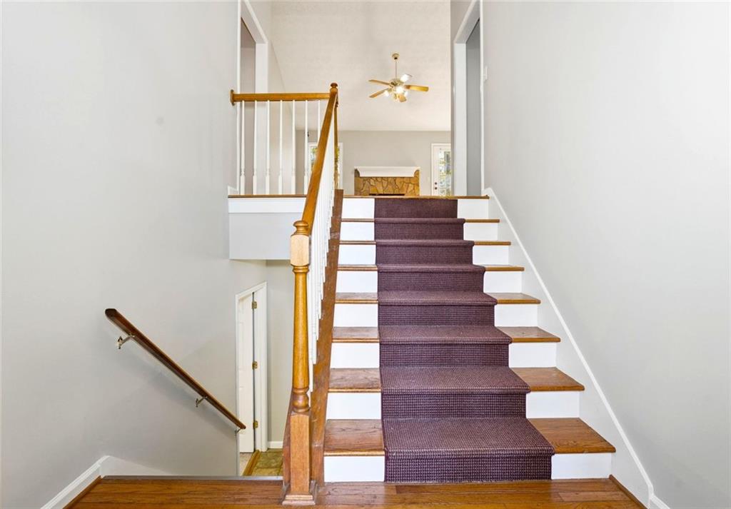 4099 Harvest Ridge Drive Douglasville, GA 30135 - Photo 8 of 46 a view of entryway and hall with wooden floor