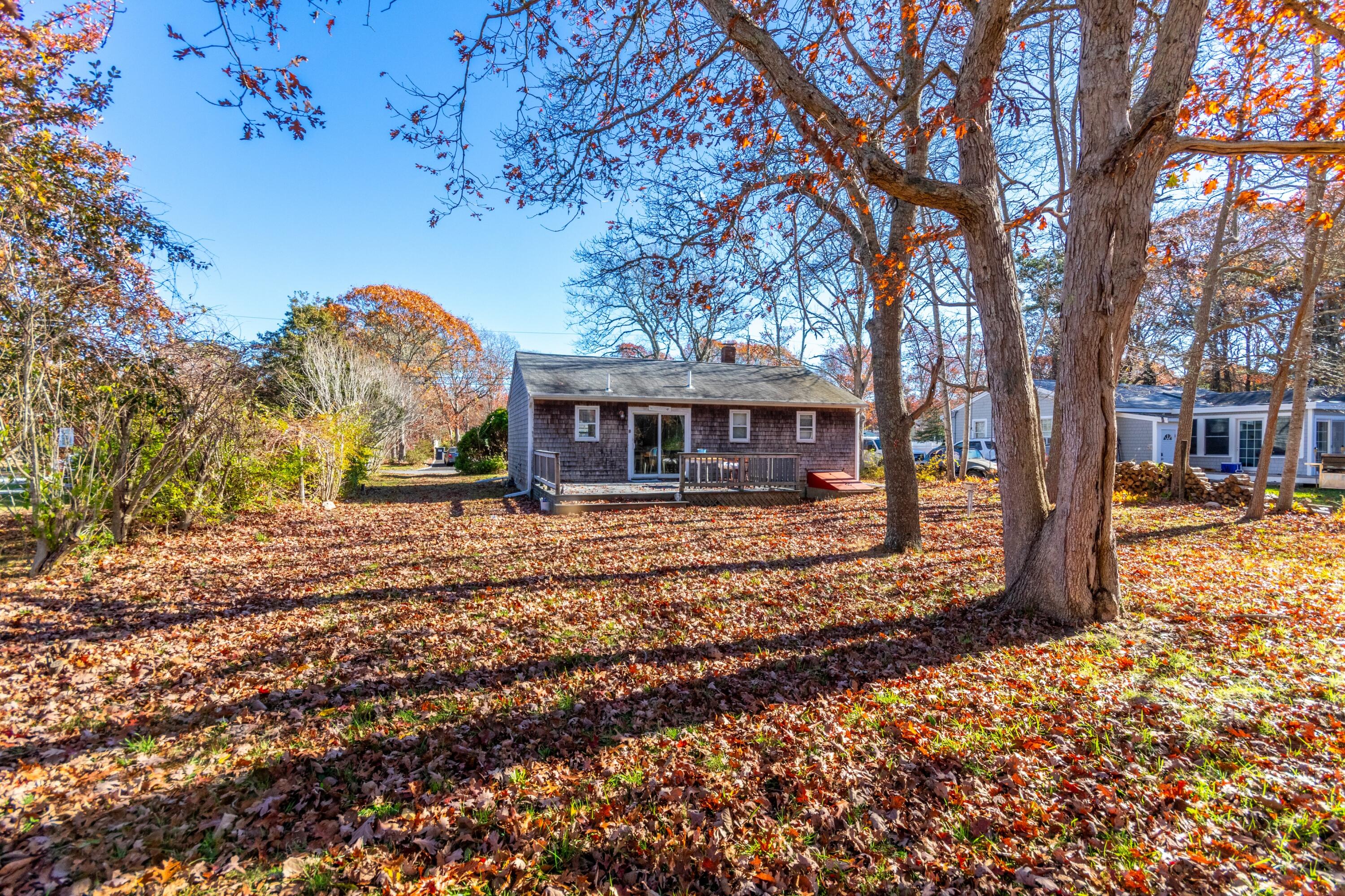 487 Lincoln Rd Extension Hyannis, MA 02601 - Photo 14 of 18 Back of house and deck