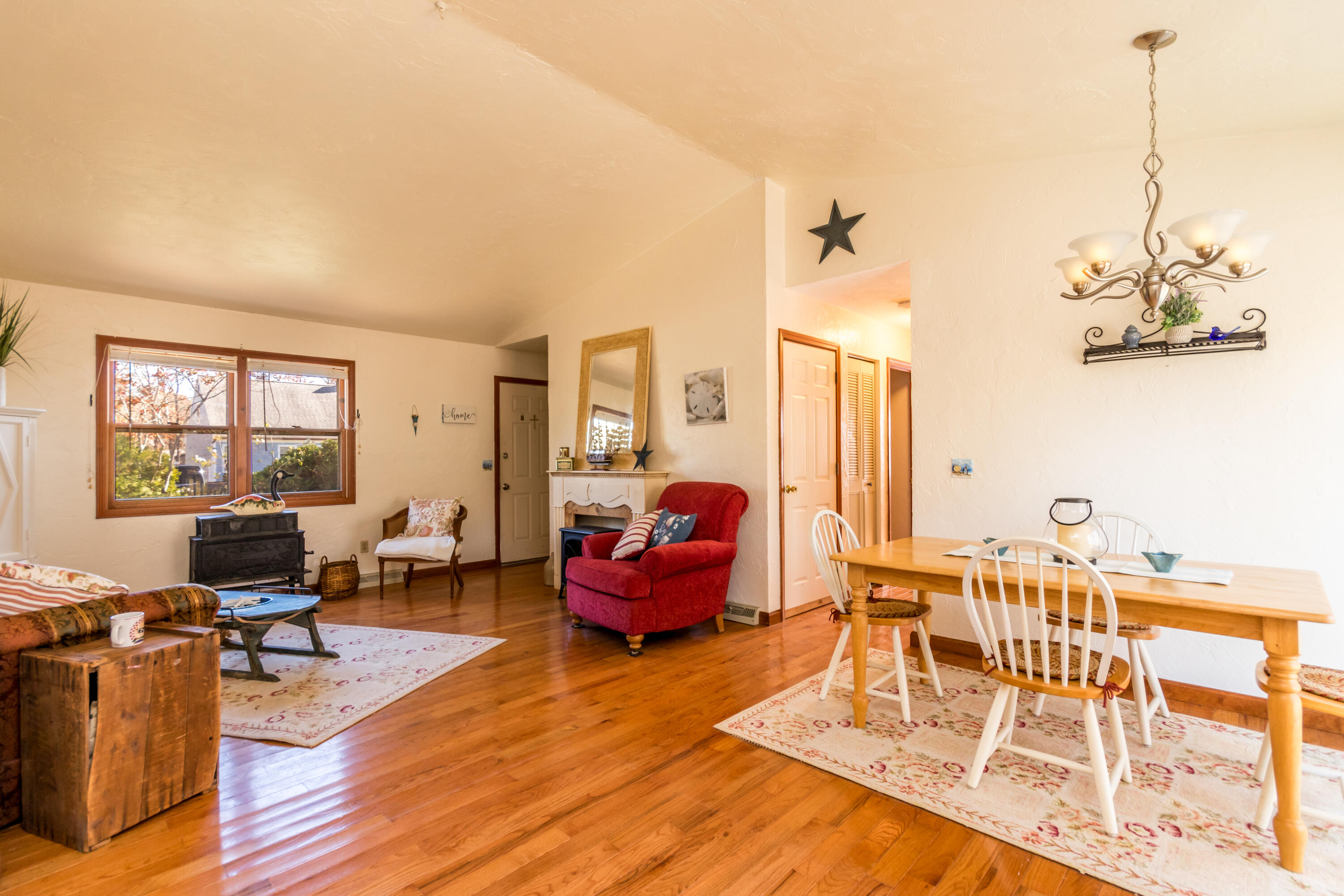 487 Lincoln Rd Extension Hyannis, MA 02601 - Photo 5 of 18 Dining opens to living room