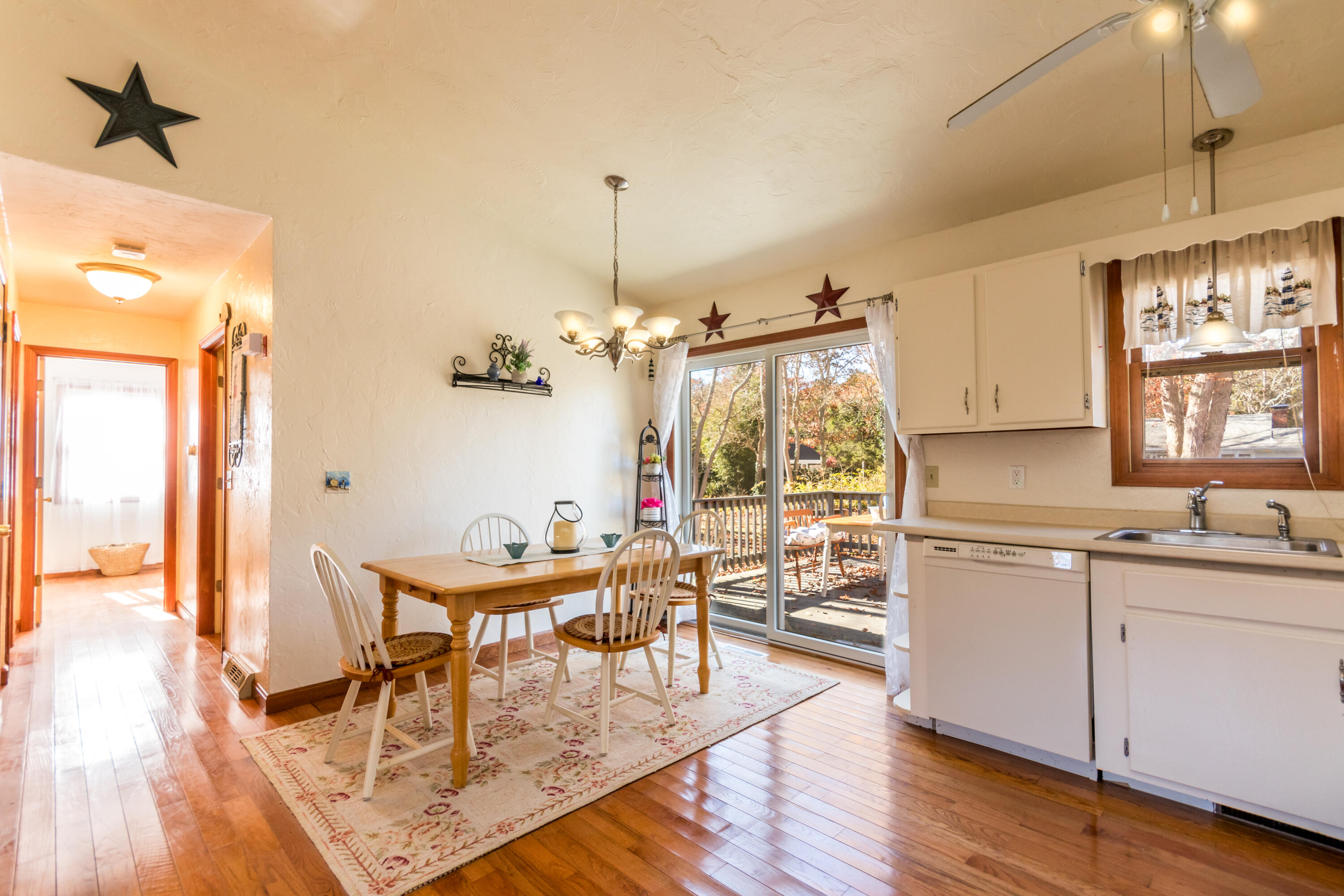 487 Lincoln Rd Extension Hyannis, MA 02601 - Photo 7 of 18 Dining with slider to deck