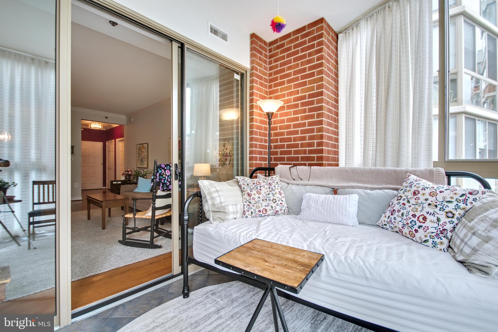 940 Astern Way, Unit 309 Annapolis, MD 21401 - Photo 19 of 52 a living room with furniture and a large window