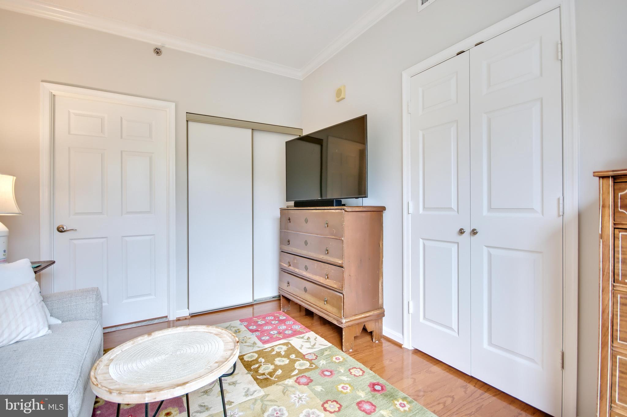 940 Astern Way, Unit 309 Annapolis, MD 21401 - Photo 30 of 52 a living room with furniture and a flat screen tv