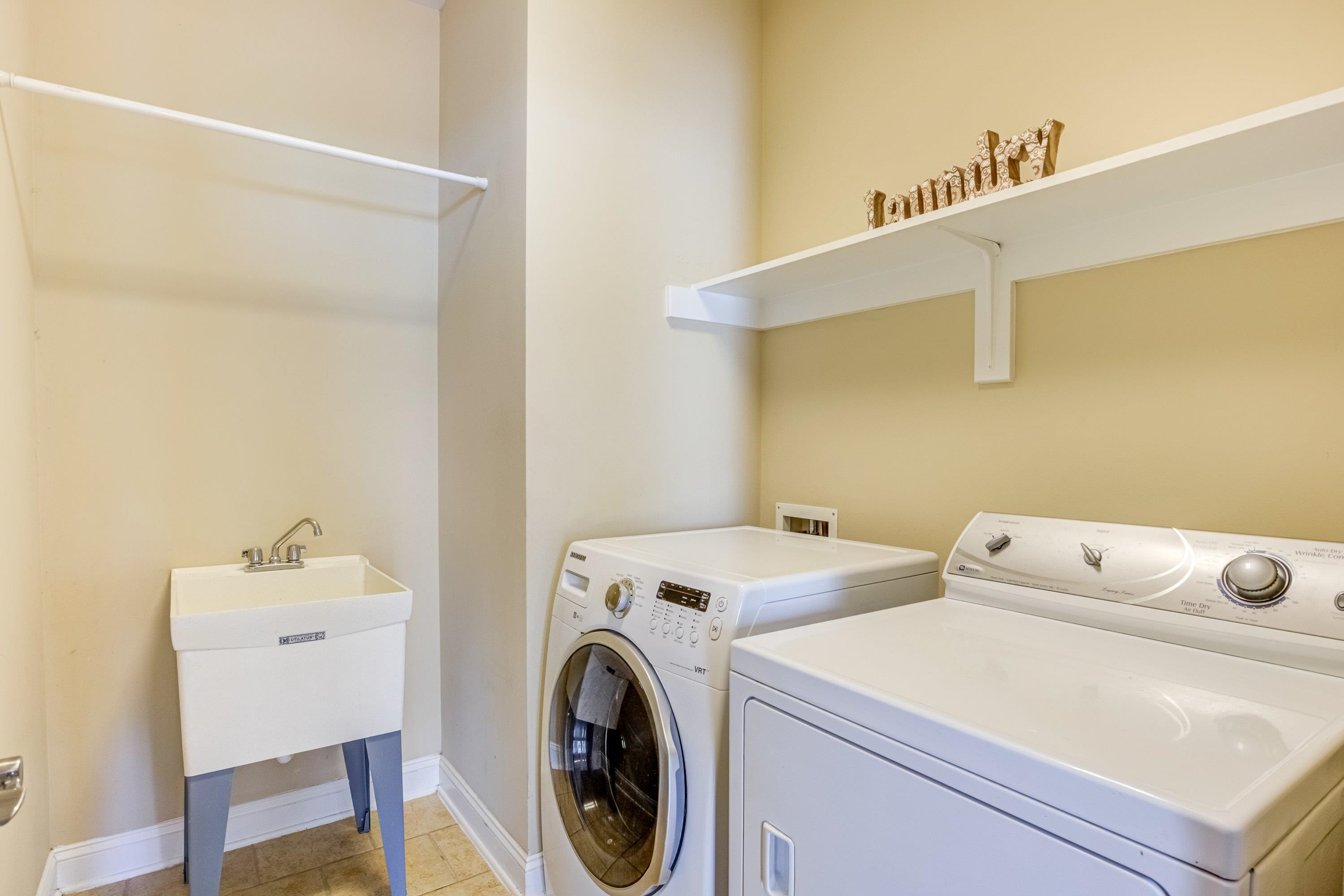 1911 Hornbeck Court Raleigh, NC 27614 - Photo 19 of 47 a utility room with dryer and washer
