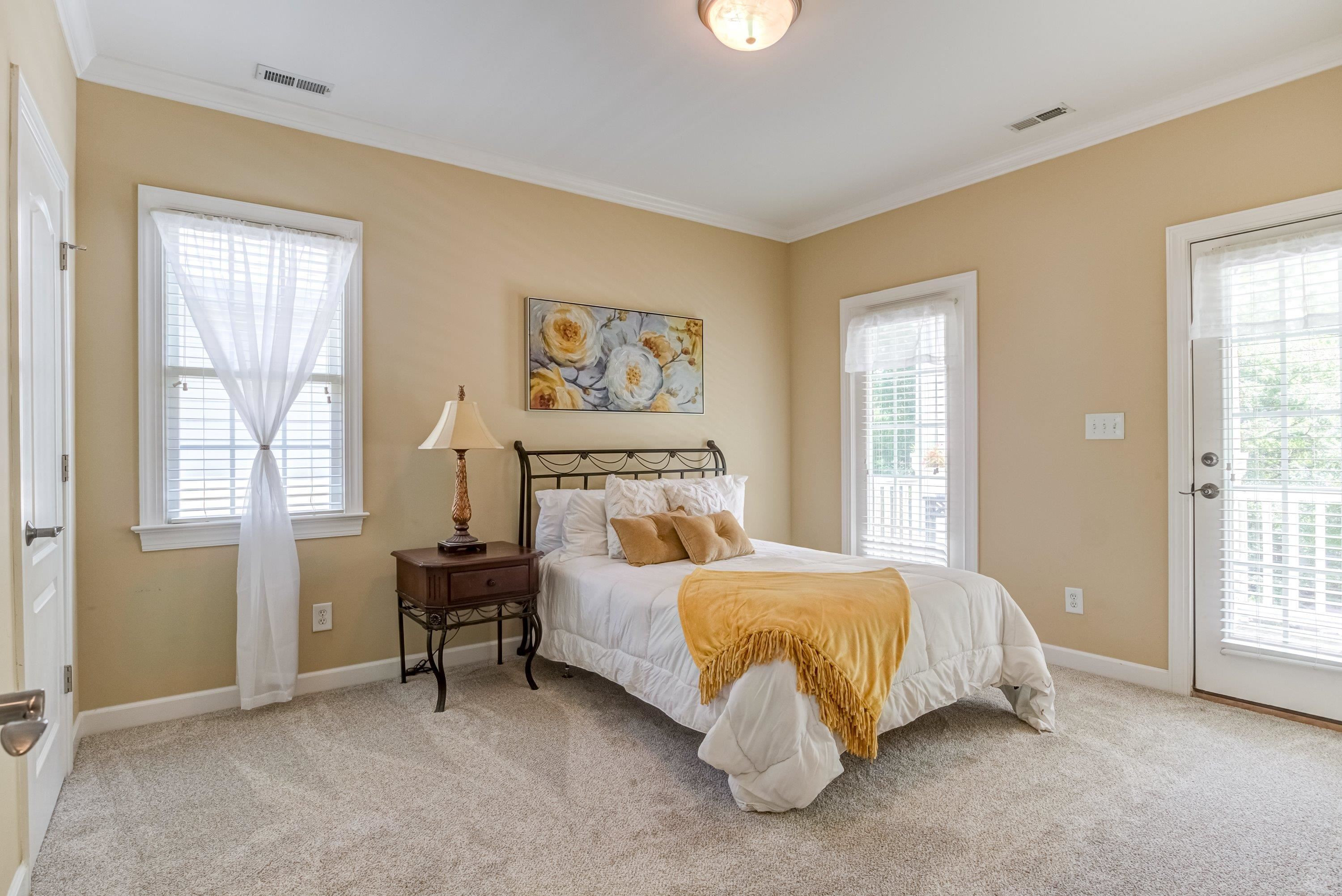 1911 Hornbeck Court Raleigh, NC 27614 - Photo 31 of 47 a bedroom with a bed and a window