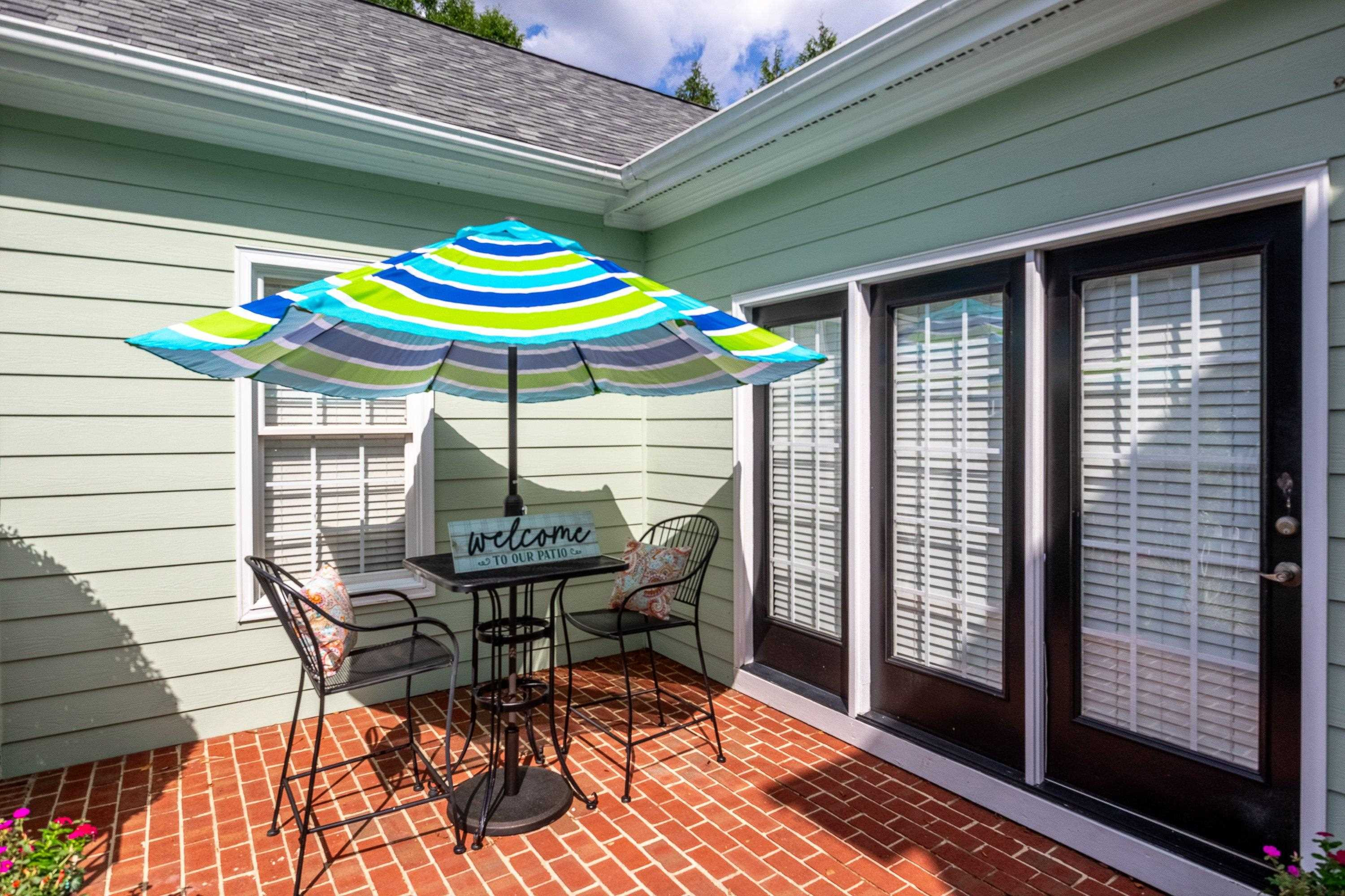 1911 Hornbeck Court Raleigh, NC 27614 - Photo 36 of 47 a table and chairs in patio