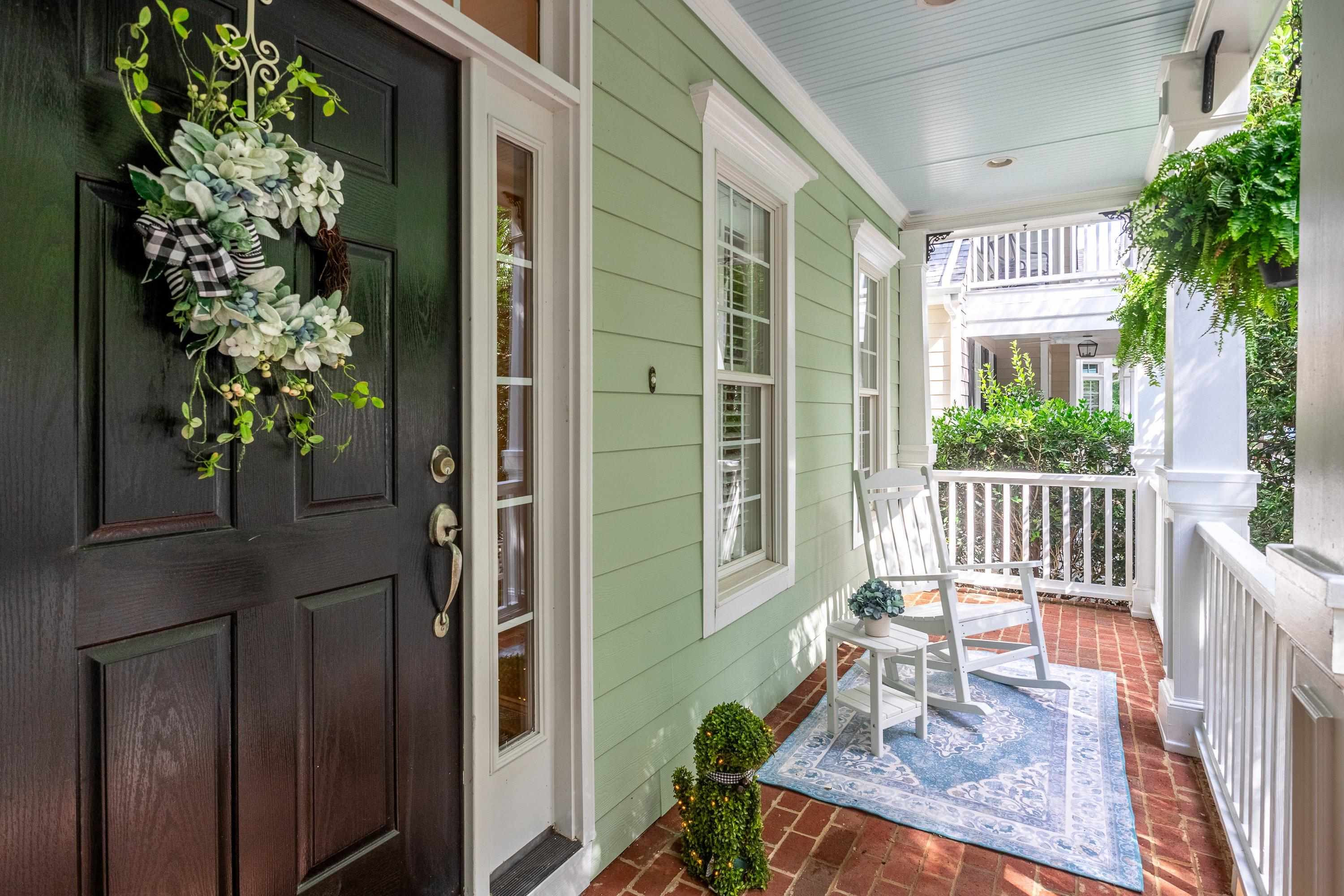 1911 Hornbeck Court Raleigh, NC 27614 - Photo 4 of 47 a view of a house with a porch and furniture