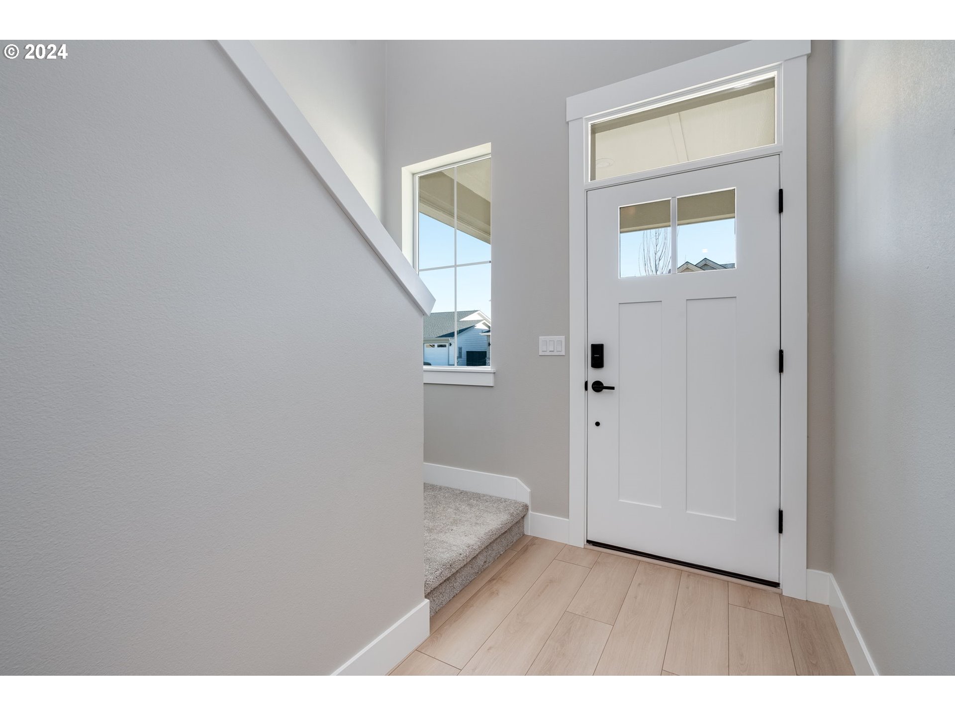 3703 South Arwana Lane Ridgefield, WA 98642 - Photo 11 of 35 a view of an entryway with wooden floor