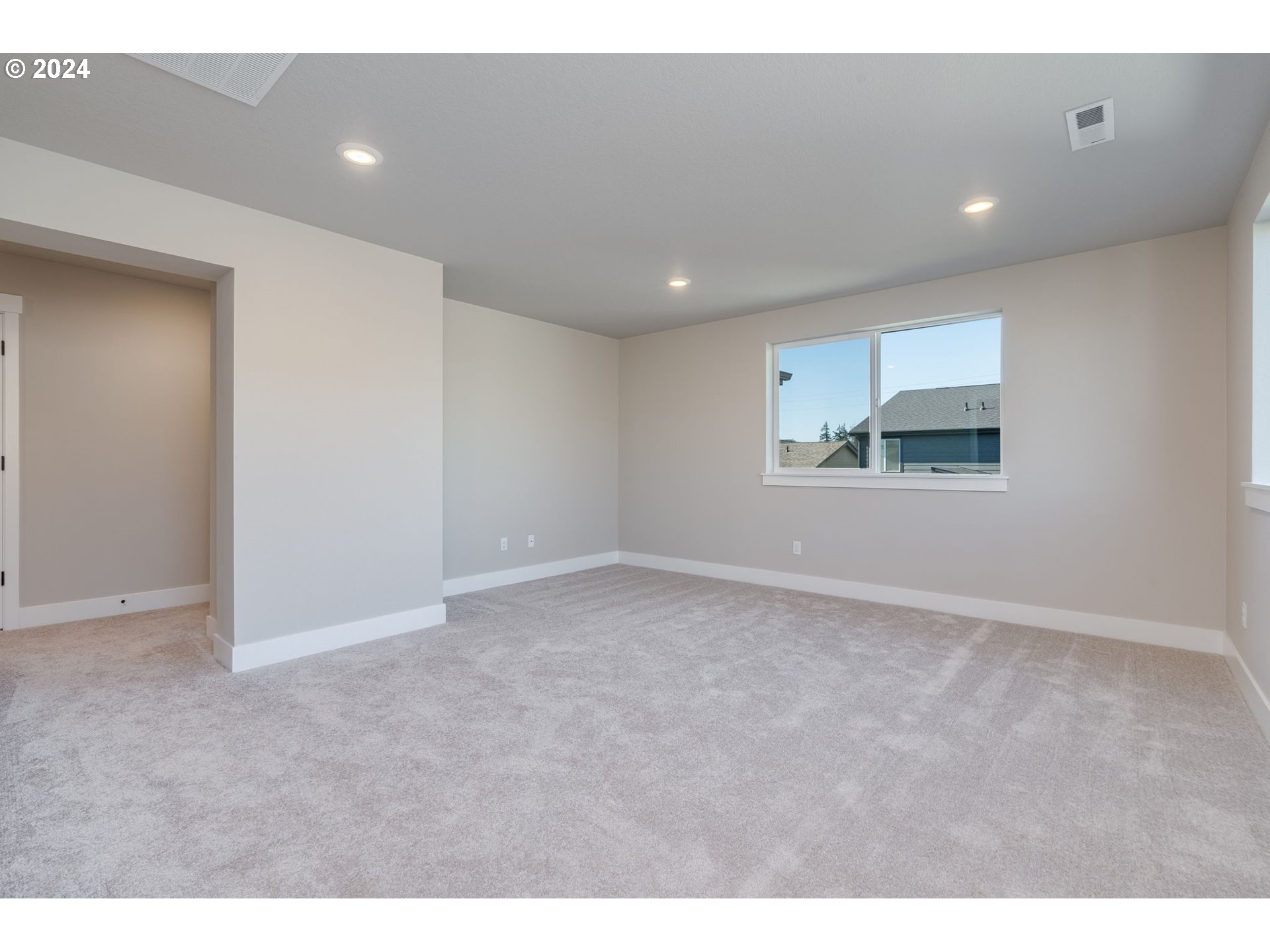 3703 South Arwana Lane Ridgefield, WA 98642 - Photo 29 of 35 a view of an empty room with a window