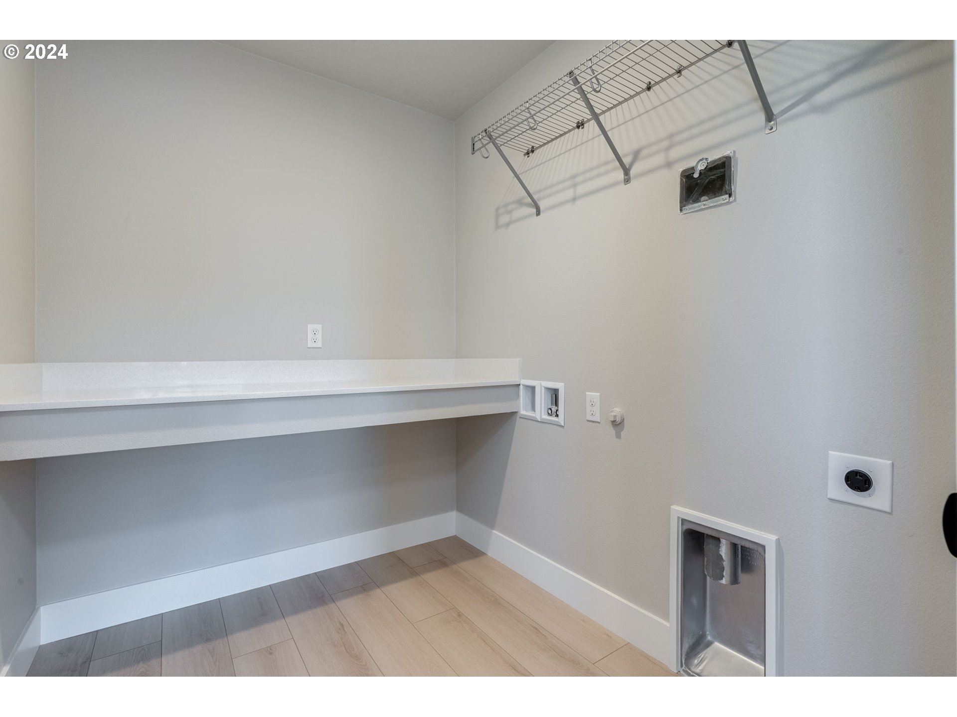 3703 South Arwana Lane Ridgefield, WA 98642 - Photo 32 of 35 a view of a room with racks on the wall