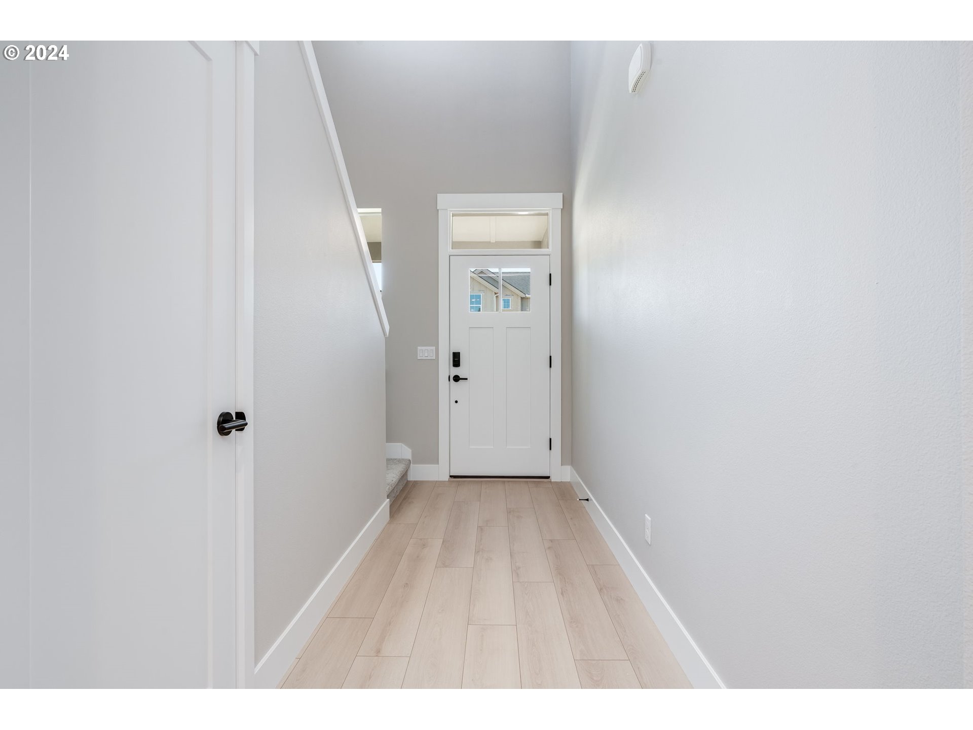 3703 South Arwana Lane Ridgefield, WA 98642 - Photo 10 of 35 a view of a room with wooden floor