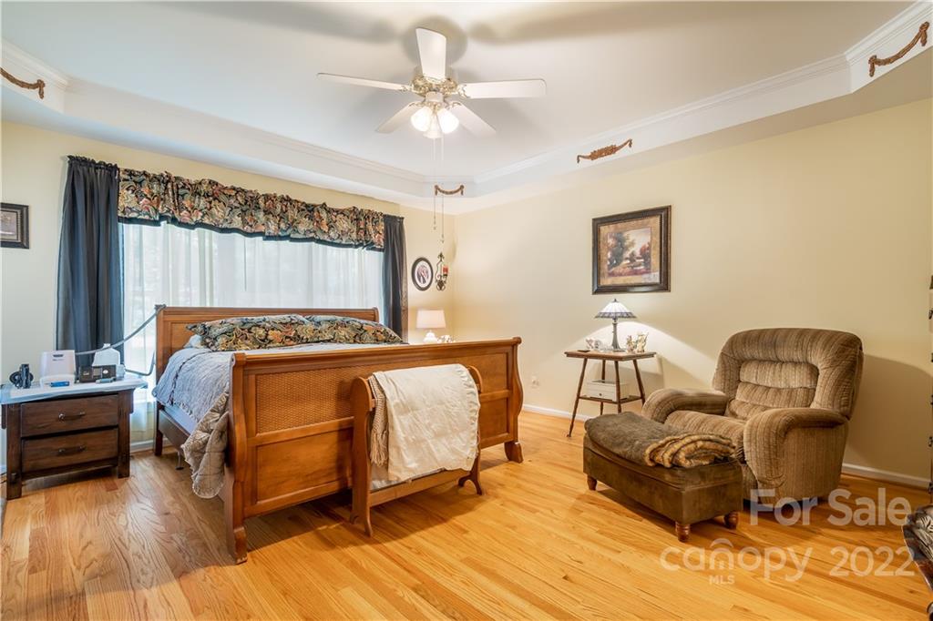 7545 Windy Pine Circle, Unit 30 Denver, NC 28037 - Photo 15 of 38 a bedroom with furniture and a window