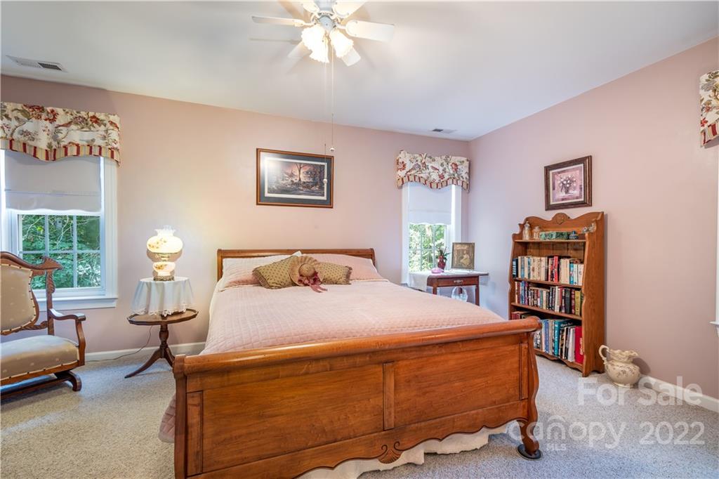 7545 Windy Pine Circle, Unit 30 Denver, NC 28037 - Photo 18 of 38 a bedroom with a bed furniture and a window