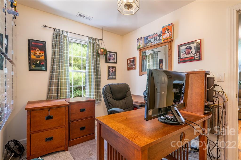 7545 Windy Pine Circle, Unit 30 Denver, NC 28037 - Photo 20 of 38 a room with furniture and musical instruments