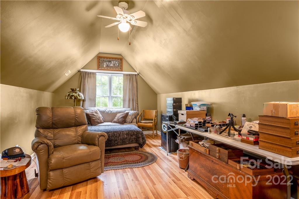 7545 Windy Pine Circle, Unit 30 Denver, NC 28037 - Photo 21 of 38 a living room with furniture and a window