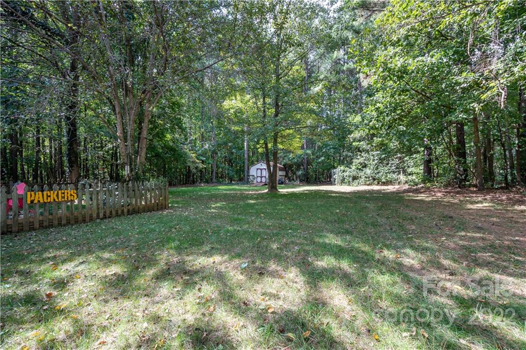 7545 Windy Pine Circle, Unit 30 Denver, NC 28037 - Photo 24 of 38 a view of outdoor space with trees all around