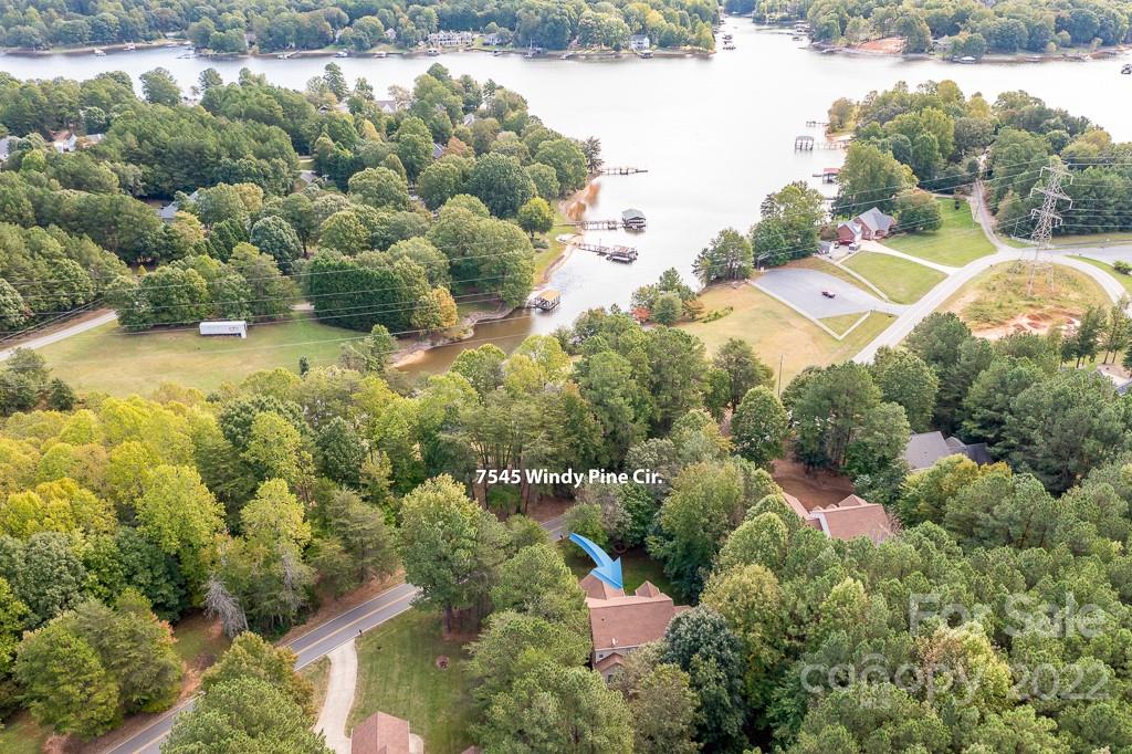 7545 Windy Pine Circle, Unit 30 Denver, NC 28037 - Photo 31 of 38 a view of a house with a yard and street