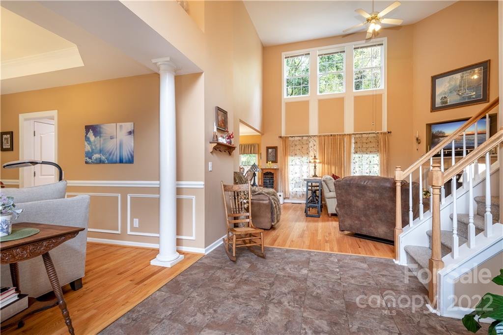 7545 Windy Pine Circle, Unit 30 Denver, NC 28037 - Photo 5 of 38 a living room with fireplace furniture and a window
