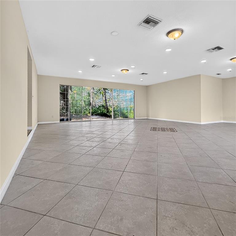 17220 Estes Road Lutz, FL 33548 - Photo 24 of 25 a view of an empty room with a window