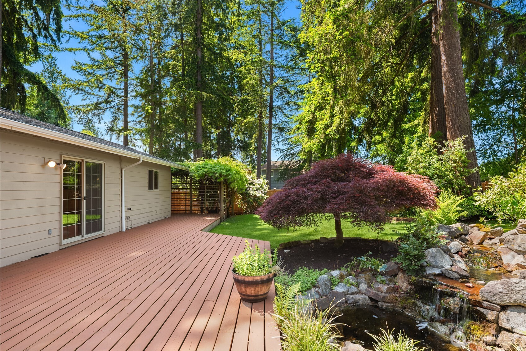 22809 38th Avenue Southeast Bothell, WA 98021 - Photo 26 of 40 a view of a house with a yard
