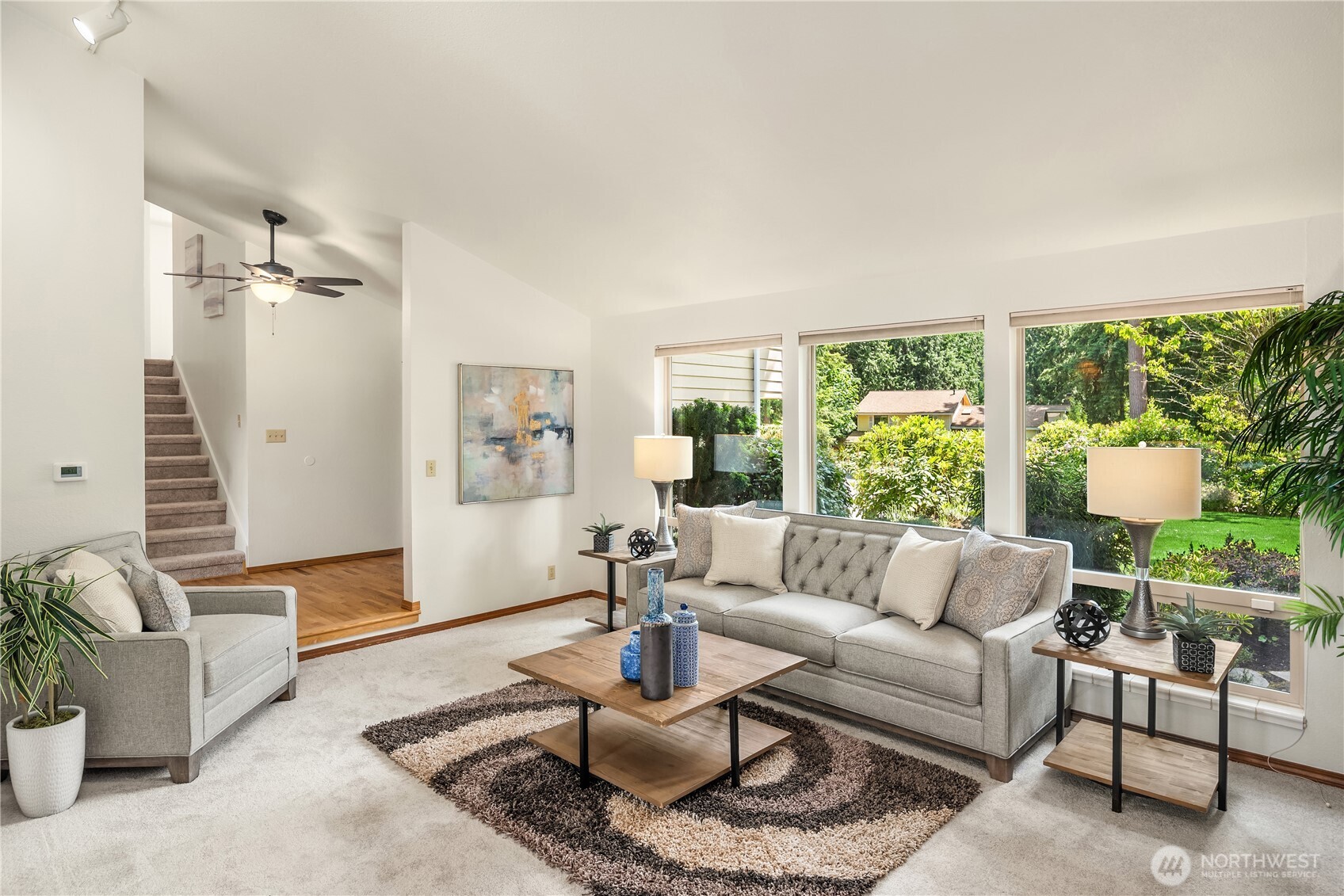 22809 38th Avenue Southeast Bothell, WA 98021 - Photo 4 of 40 a living room with furniture and a large window