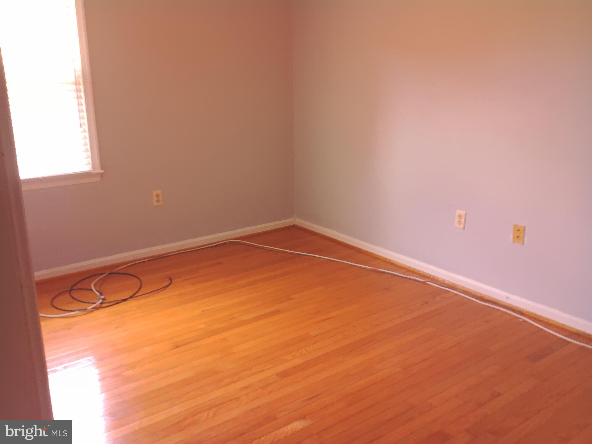 11603 Butlers Branch Road Clinton, MD 20735 - Photo 15 of 42 a view of a room with an empty space and a window