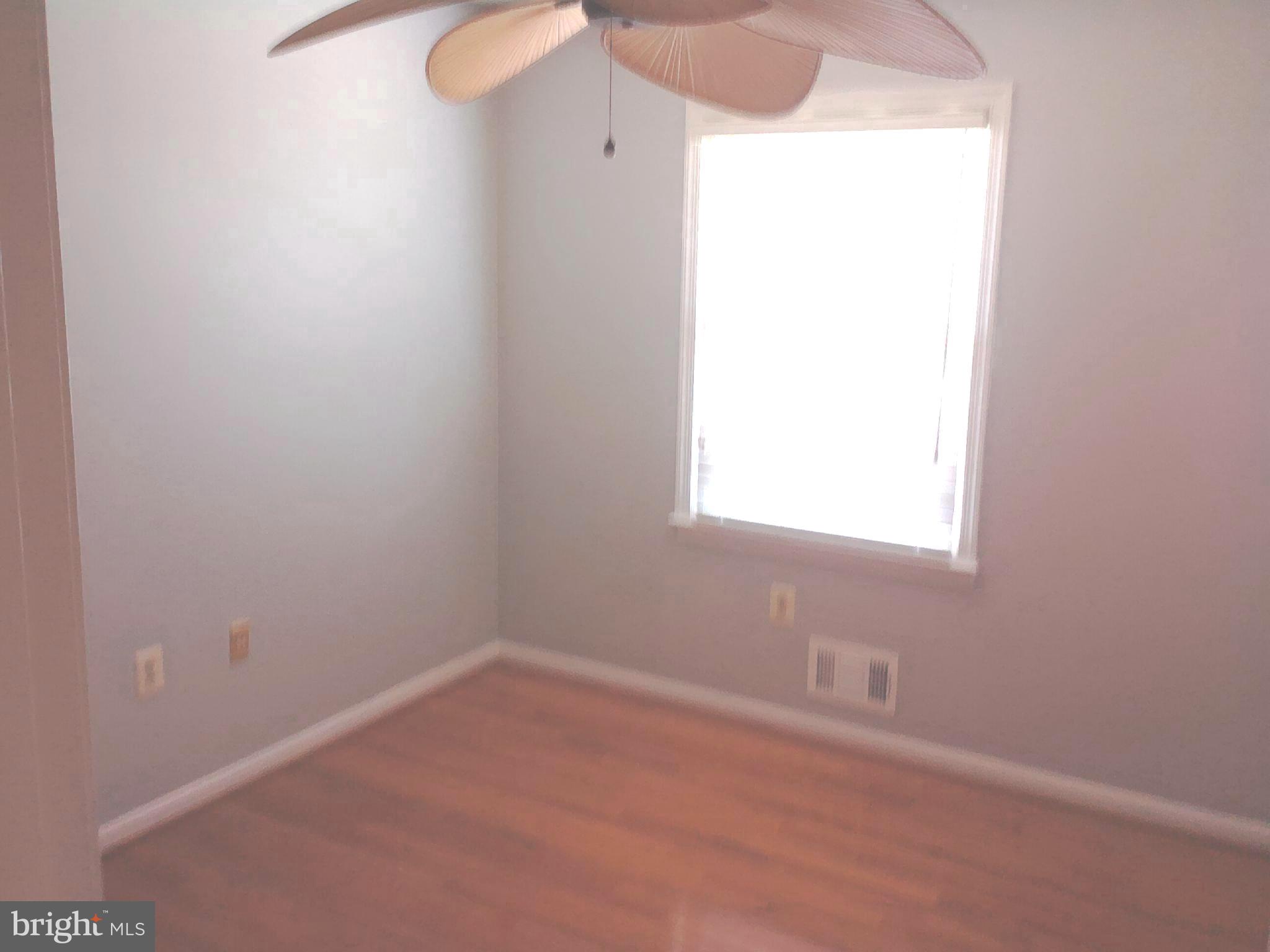 11603 Butlers Branch Road Clinton, MD 20735 - Photo 20 of 42 an empty room with a window