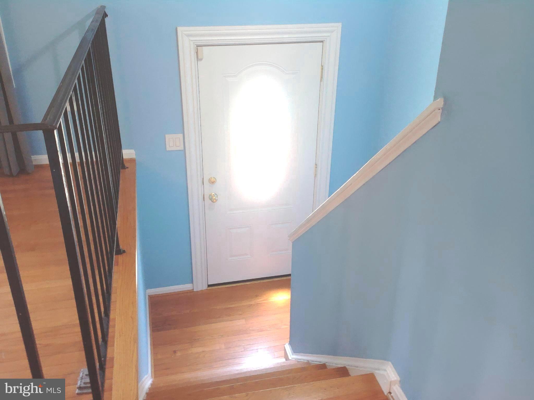 11603 Butlers Branch Road Clinton, MD 20735 - Photo 2 of 42 a view of hallway with wooden floor
