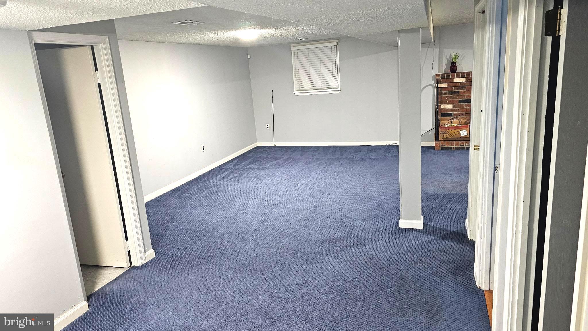 11603 Butlers Branch Road Clinton, MD 20735 - Photo 27 of 42 an empty room with walk in closet with wooden floor