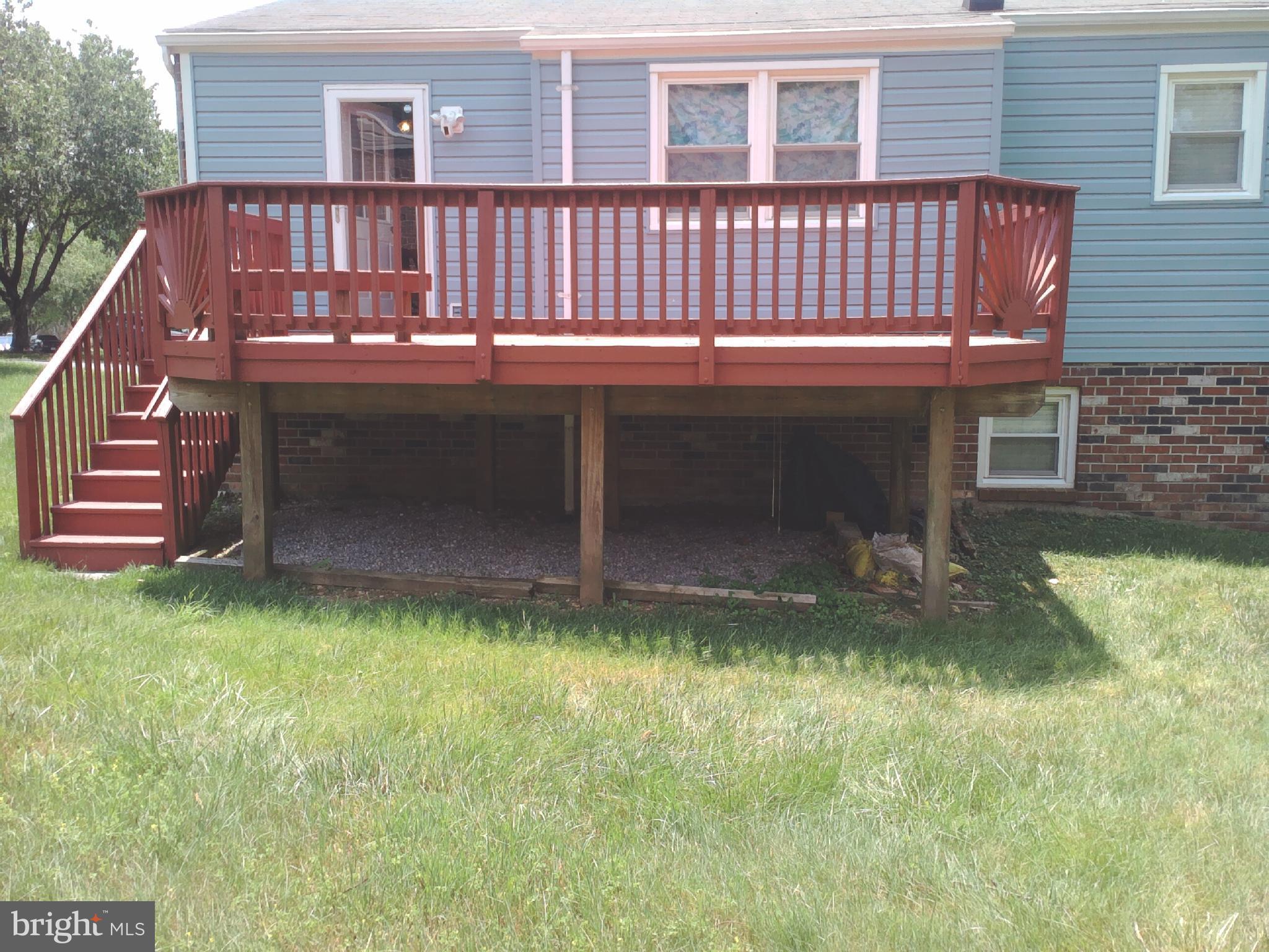 11603 Butlers Branch Road Clinton, MD 20735 - Photo 40 of 42 a view of a house with a backyard