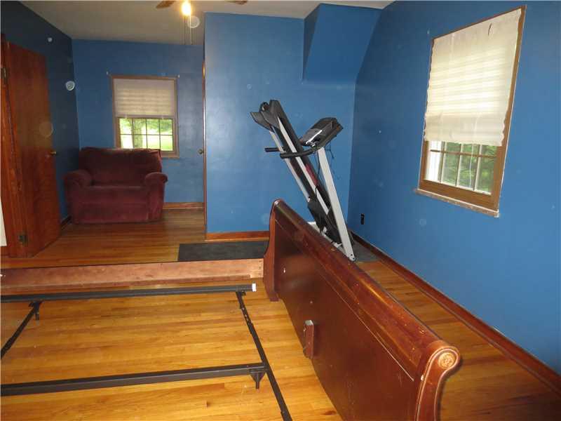 584 Freeport Road Freeport, PA 16229 - Photo 13 of 25 Master Bedroom. Has a walk-in closet and a ceiling fan with light