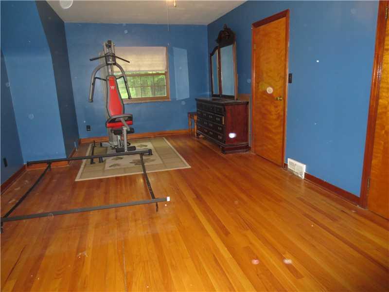 584 Freeport Road Freeport, PA 16229 - Photo 15 of 25 Bedroom. Second bedroom with walk-in closet and ceiling fan with light.