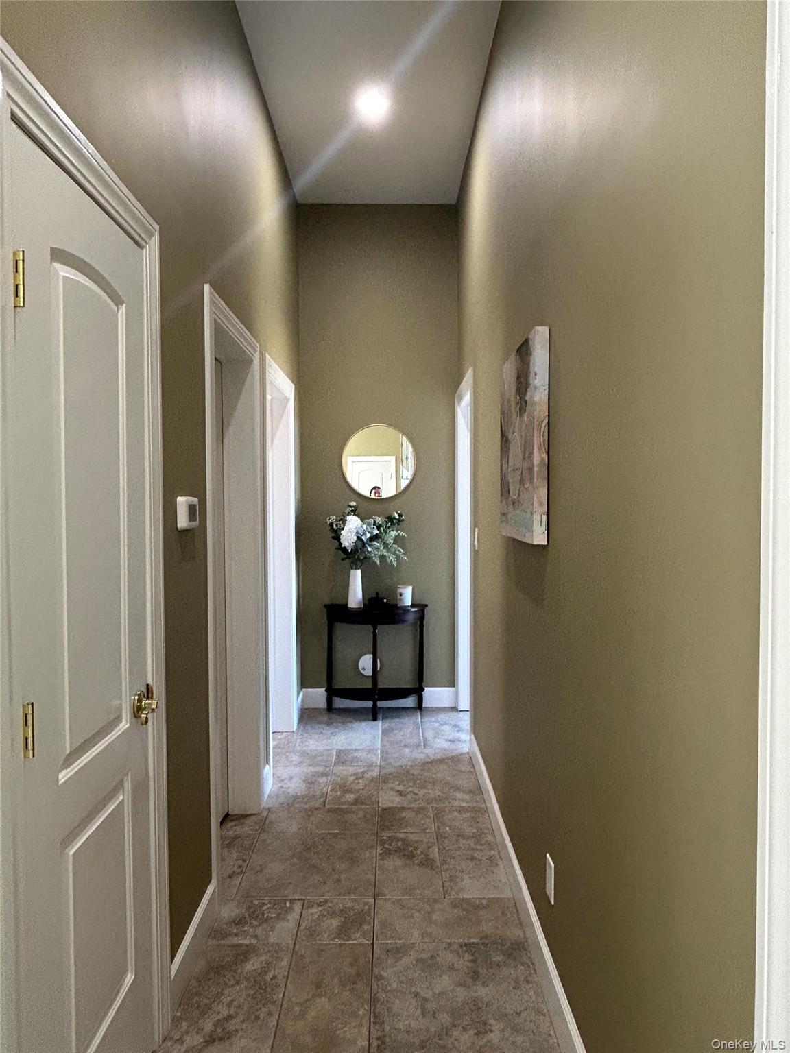 4 Vining Street Centereach, NY 11720 - Photo 12 of 26 a view of a hallway with a furniture