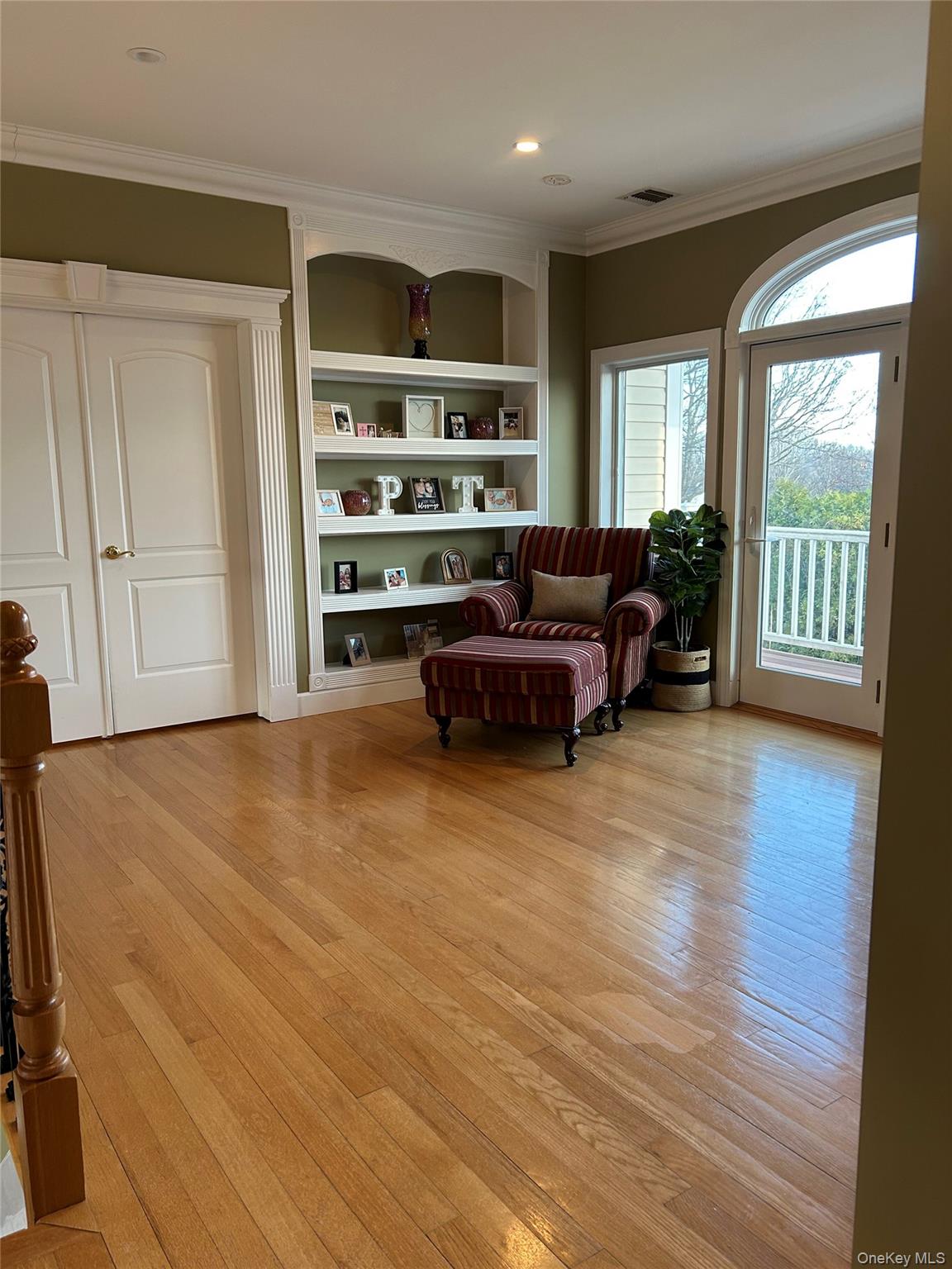 4 Vining Street Centereach, NY 11720 - Photo 16 of 26 a living room with furniture window and wooden floor