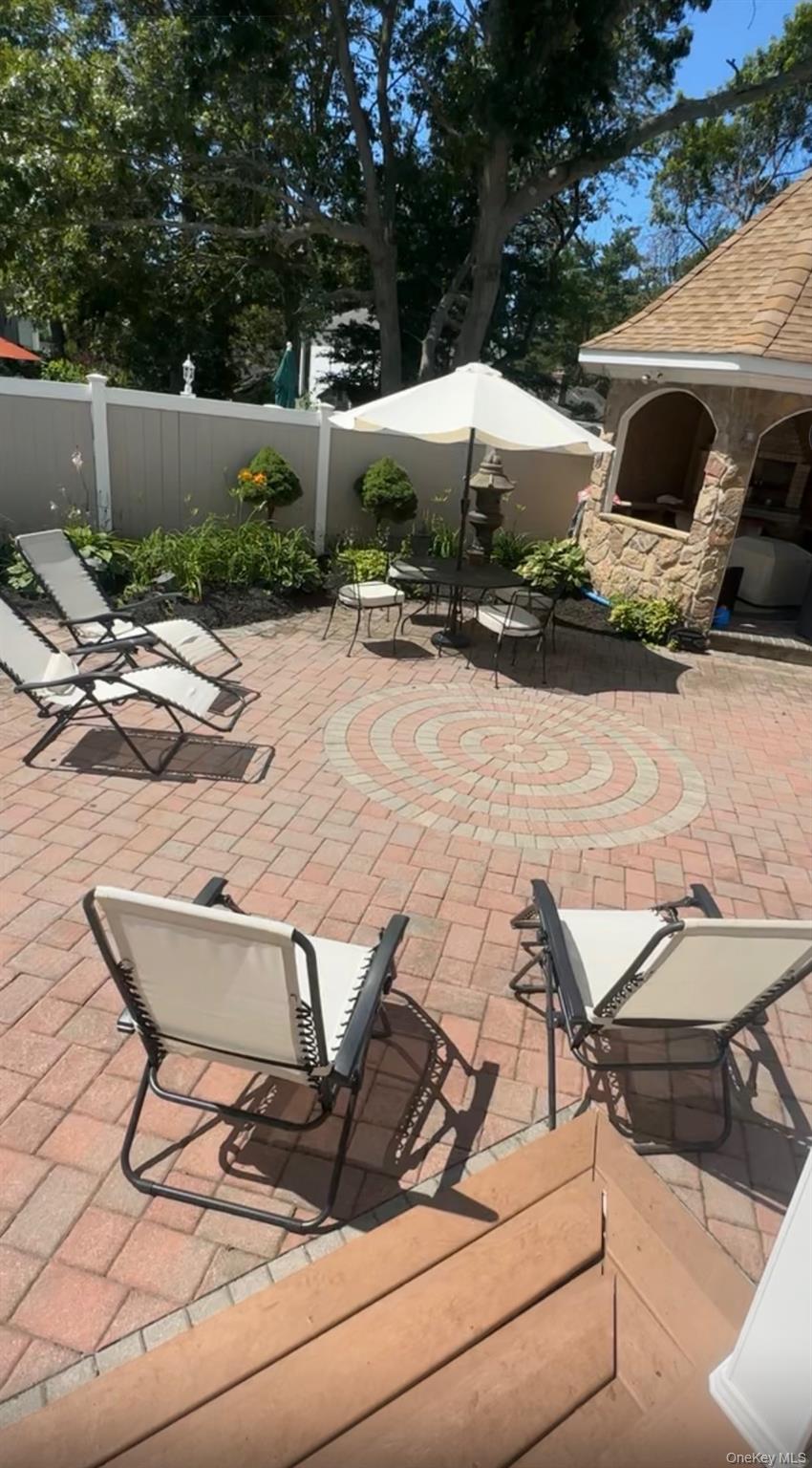 4 Vining Street Centereach, NY 11720 - Photo 26 of 26 a view of a lounge chairs on the roof deck