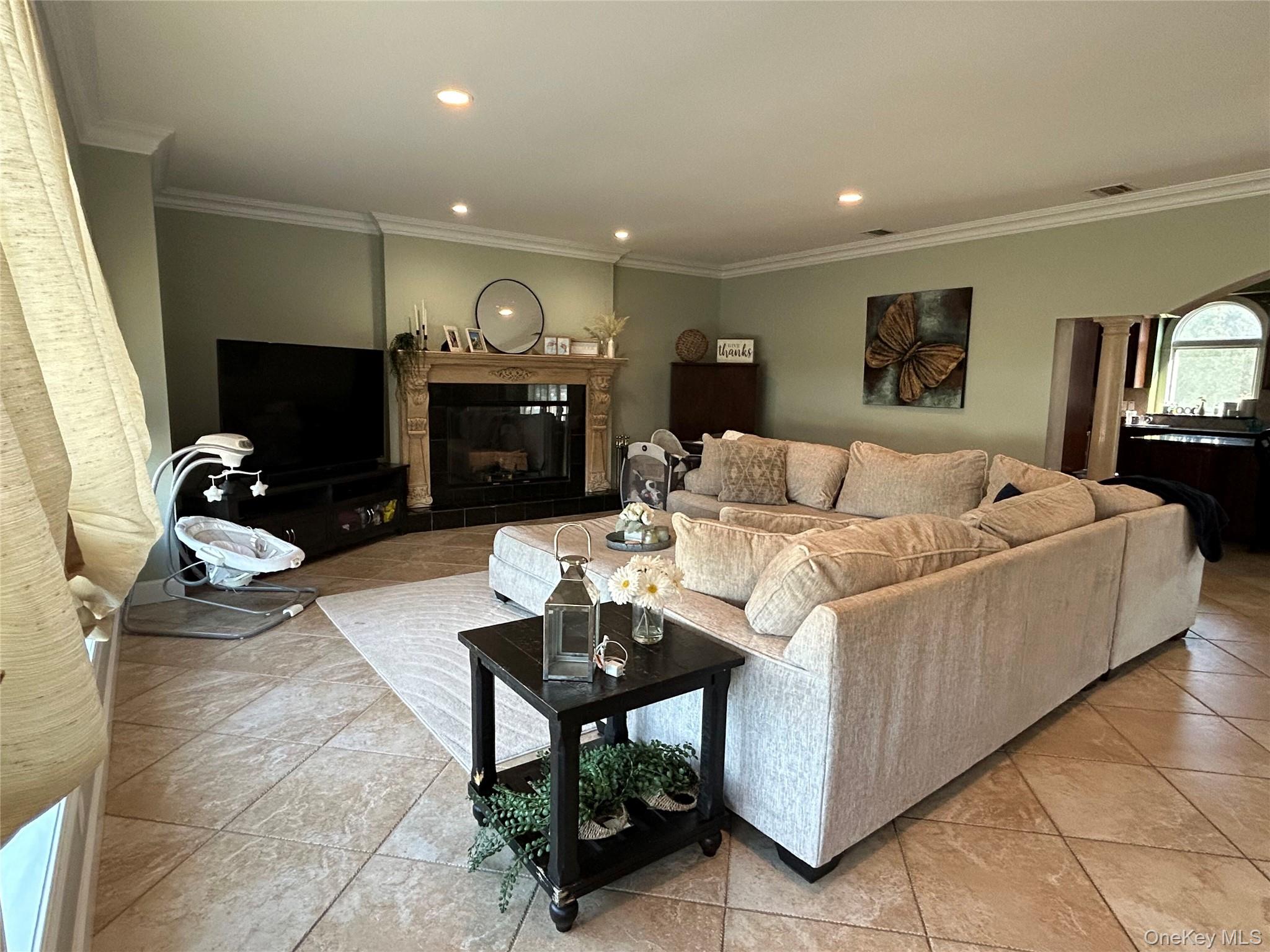 4 Vining Street Centereach, NY 11720 - Photo 6 of 26 a living room with furniture and a flat screen tv
