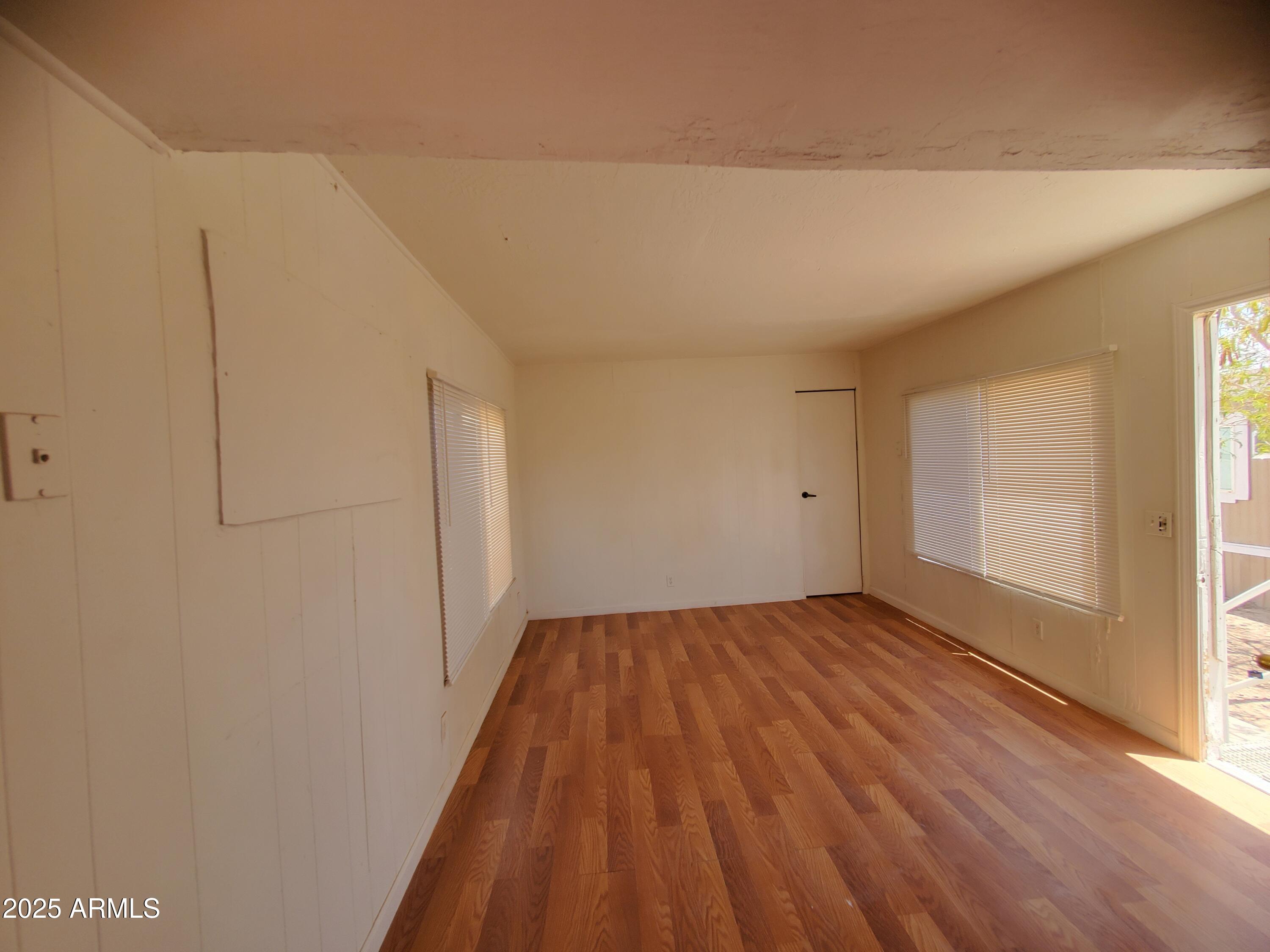 799 West Battaglia Road, Unit 22 Eloy, AZ 85131 - Photo 4 of 9 a view of an empty room and window
