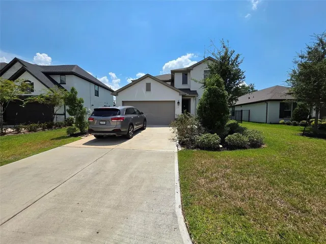 a view of house and yard