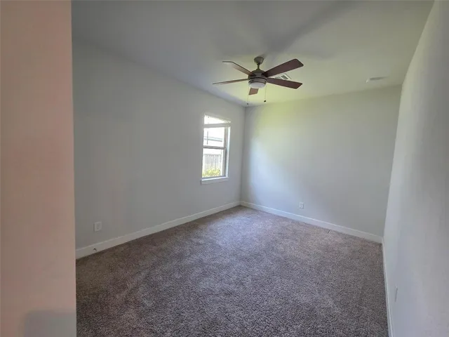 an empty room that has a window