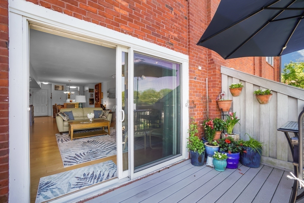 45 Main Street, Unit 112 Wareham, MA 02571 - Photo 16 of 30 a view of a porch with furniture
