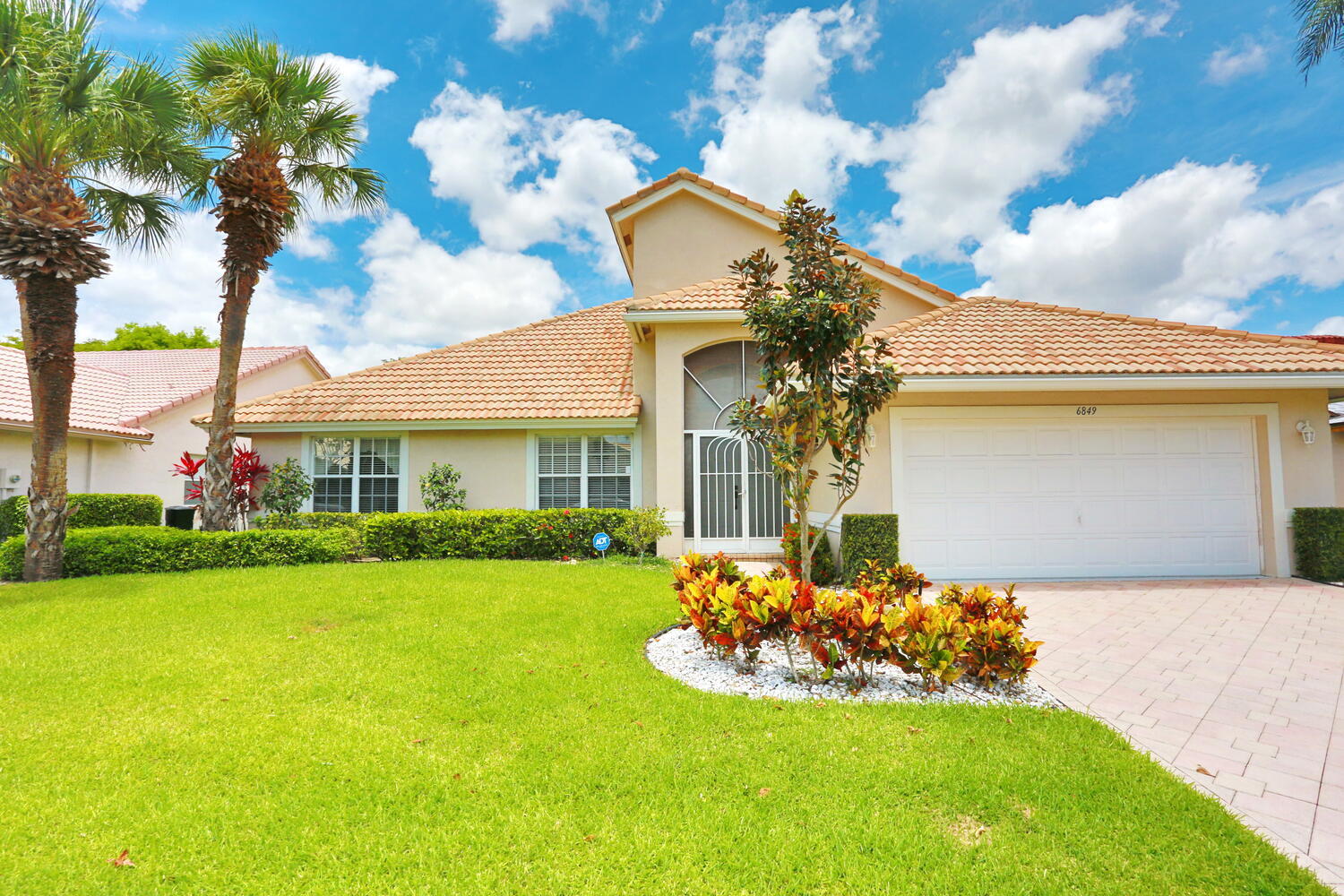 6849 Sun River Road Boynton Beach, FL 33437 - Photo 1 of 35 Exterior Front