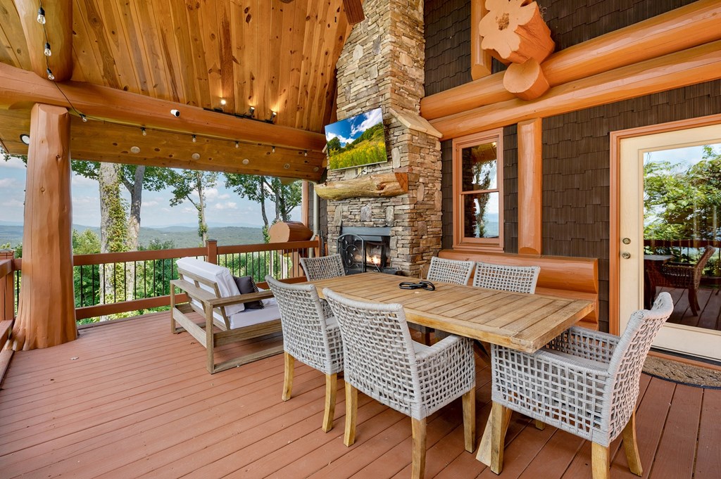 502 Overlook Drive Blue Ridge, GA 30513 - Photo 23 of 53 a view of a patio with a table and chairs