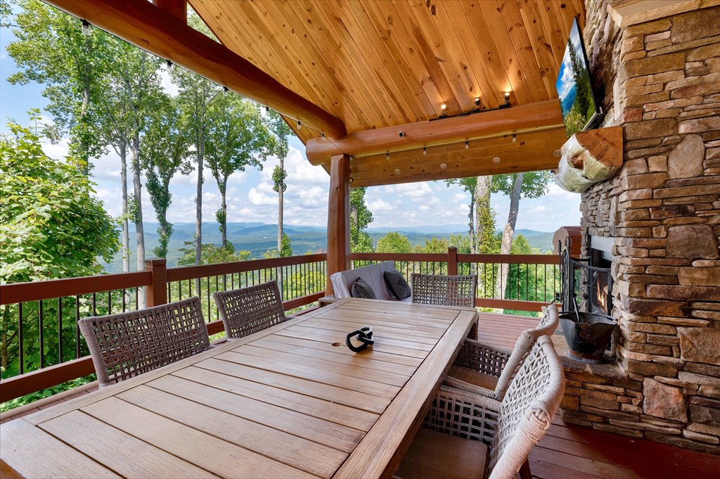 502 Overlook Drive Blue Ridge, GA 30513 - Photo 24 of 53 a view of balcony with couch and wooden floor