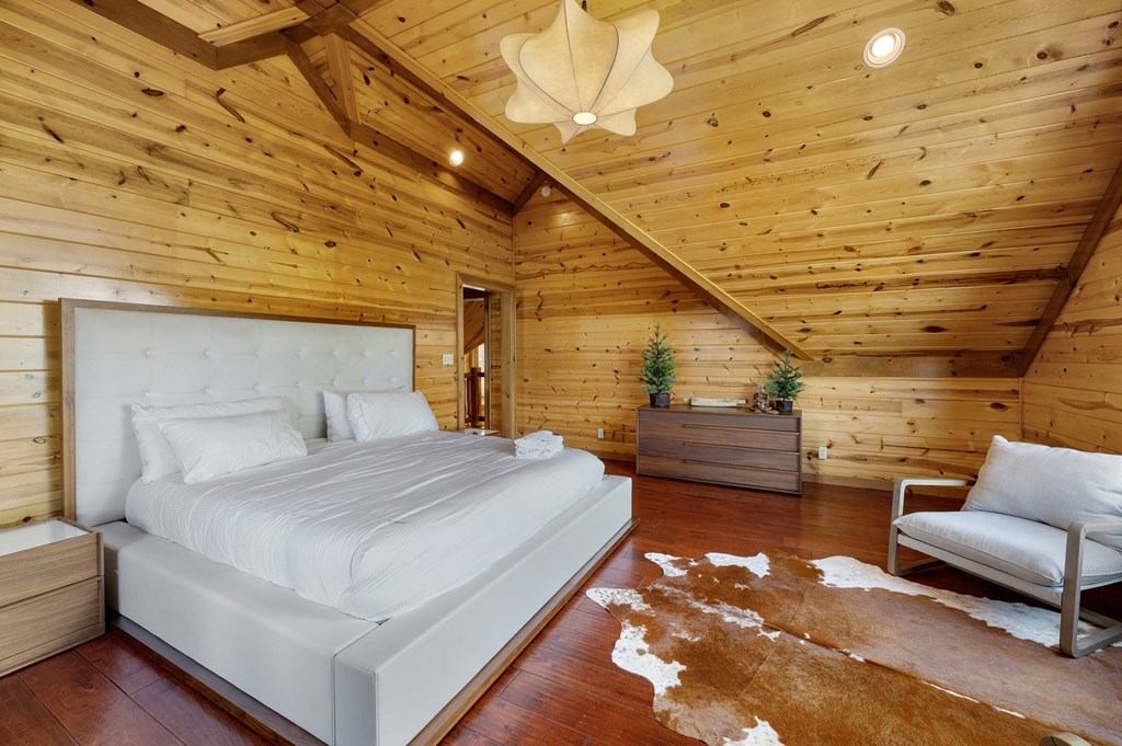 502 Overlook Drive Blue Ridge, GA 30513 - Photo 36 of 53 a bedroom with a bed and a couch