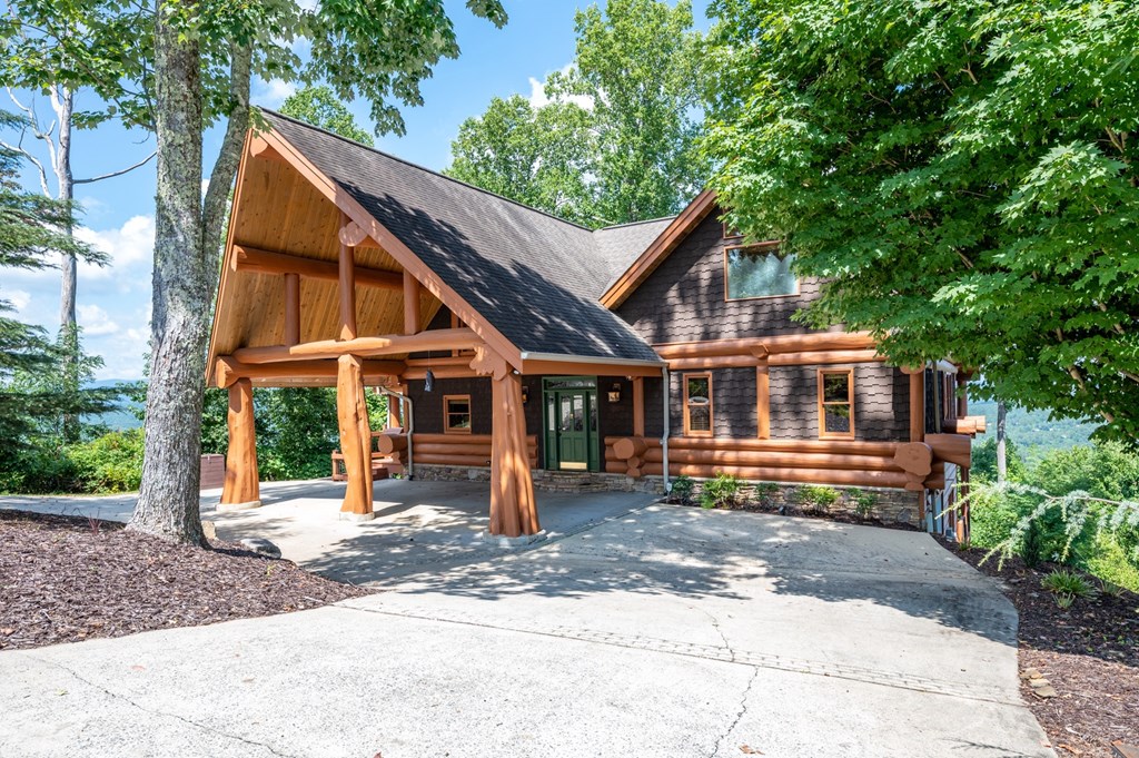 502 Overlook Drive Blue Ridge, GA 30513 - Photo 4 of 53 a front view of a house with a yard