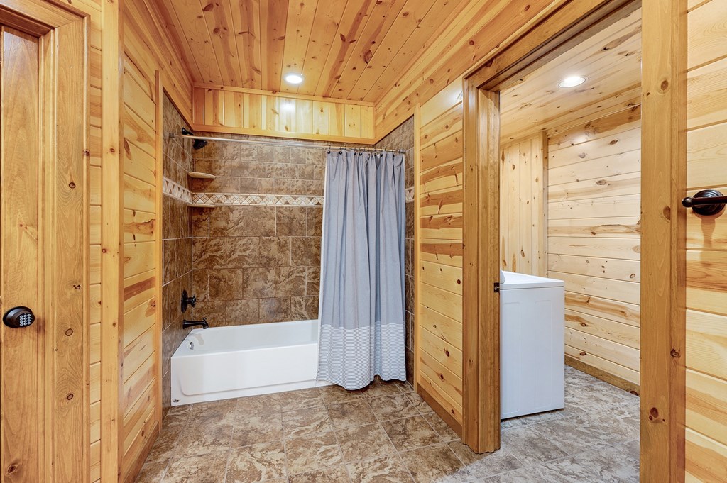 502 Overlook Drive Blue Ridge, GA 30513 - Photo 53 of 53 a bathroom with a bathtub and shower