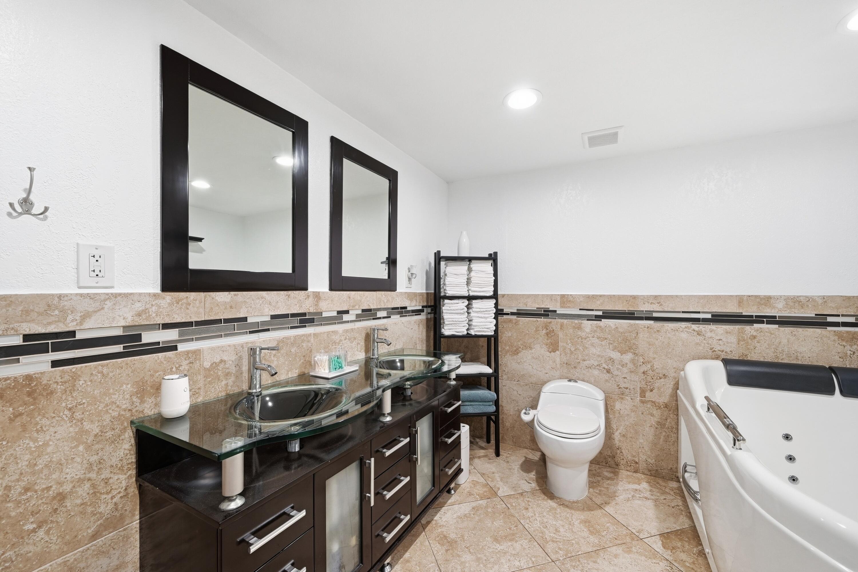 6271 Harding Street Hollywood, FL 33024 - Photo 15 of 58 a bathroom with a granite countertop sink a toilet and a mirror
